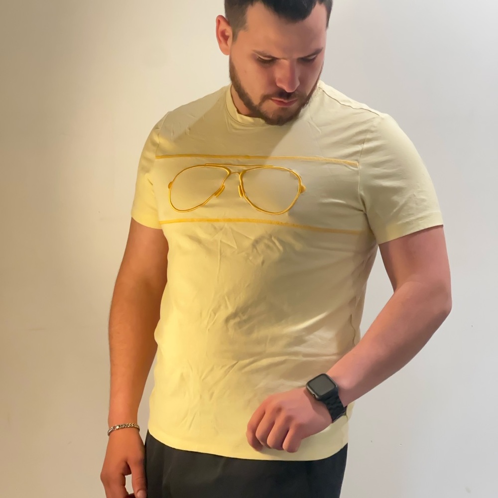 Yellow shirt with glasses design